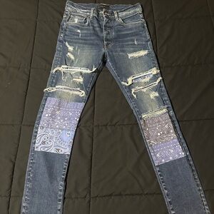 Men Distressed Blue Jeans with Patchwork